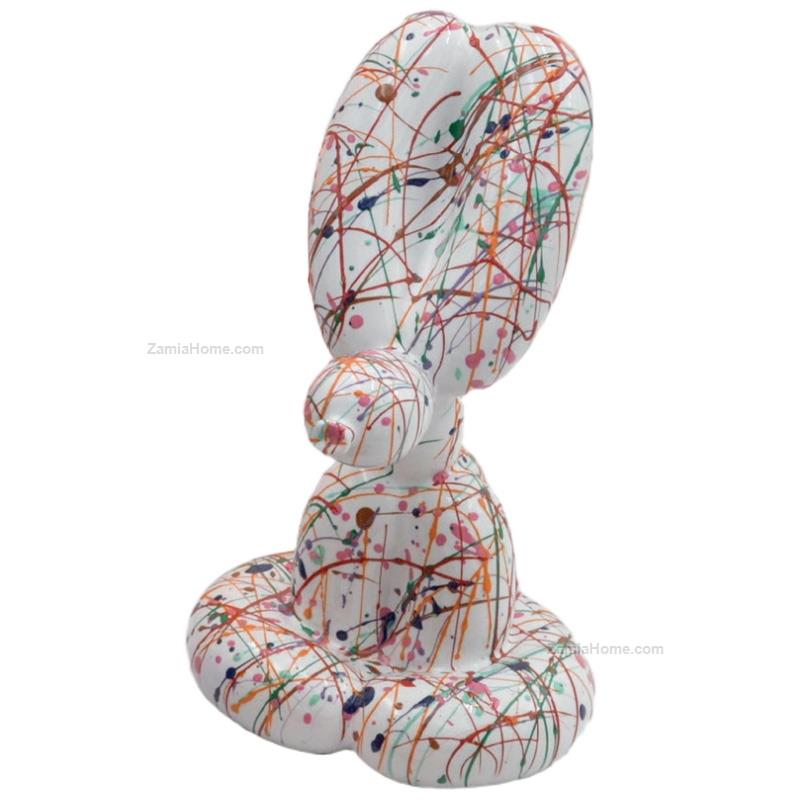 Cagnolino palloncino seduto