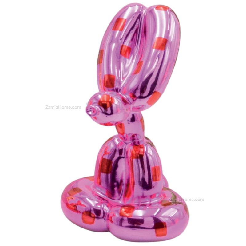 Cagnolino palloncino seduto