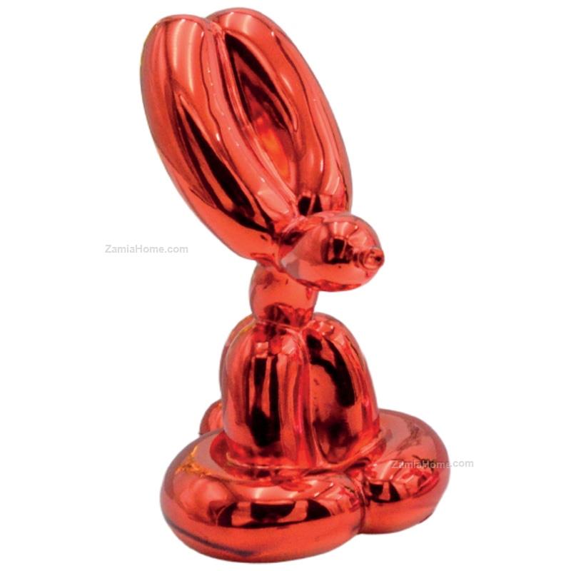 Cagnolino palloncino seduto
