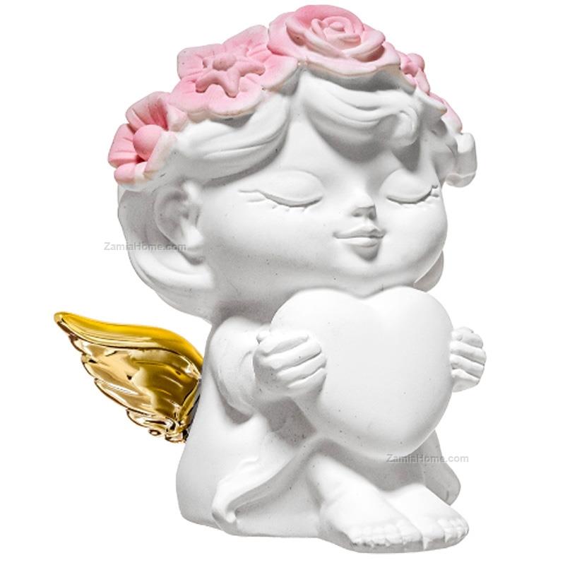 Female cherub with heart