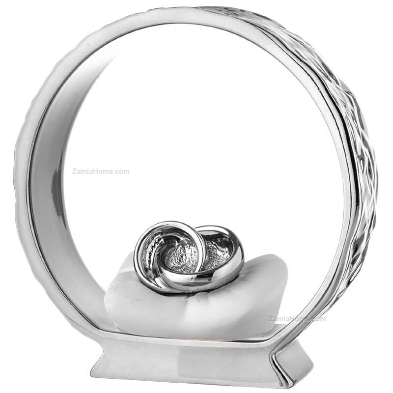 Wedding rings on silver base