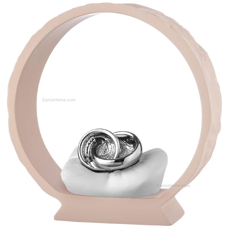 Wedding rings on powder base