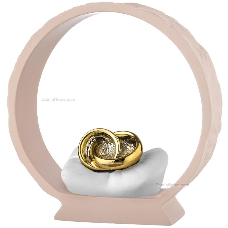 Wedding rings on powder base
