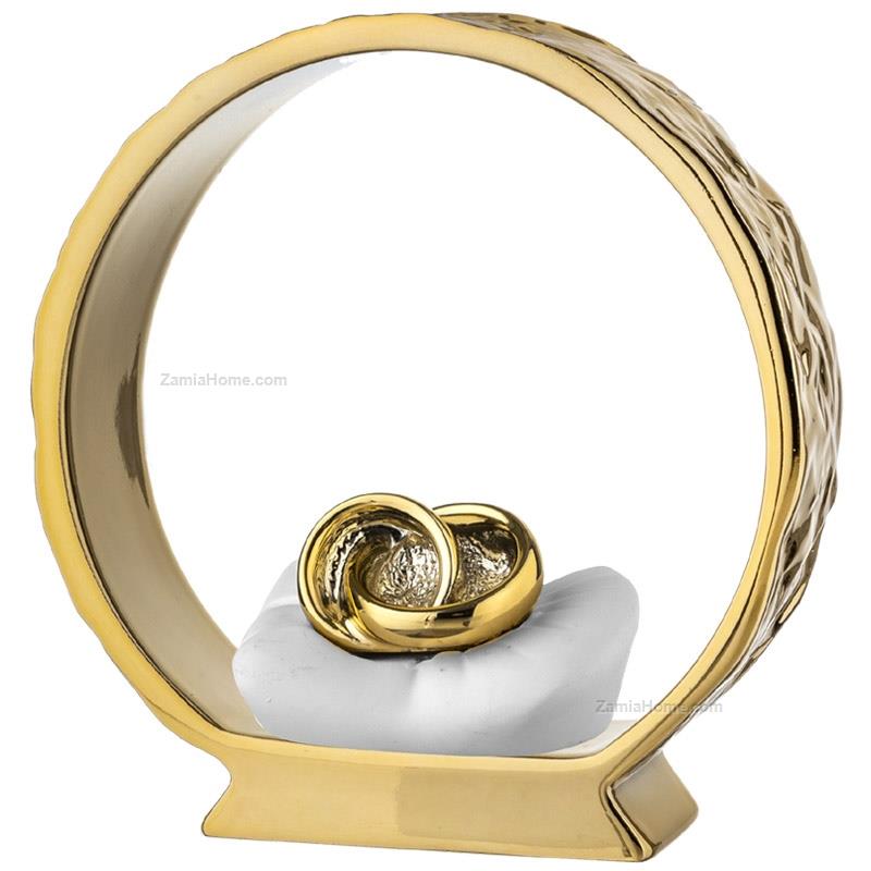 Wedding rings on golden base