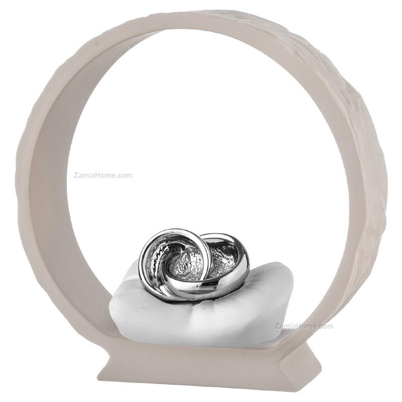 Wedding rings on grey base