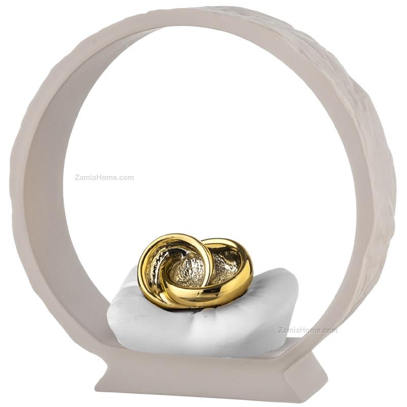Wedding rings on grey base