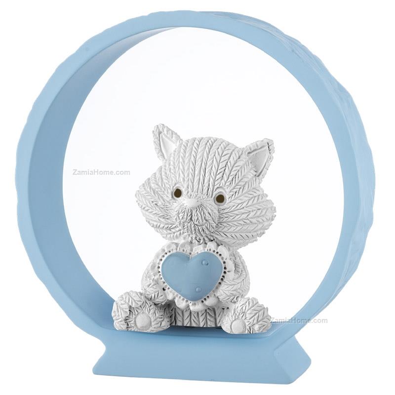 Kitten on light blue base