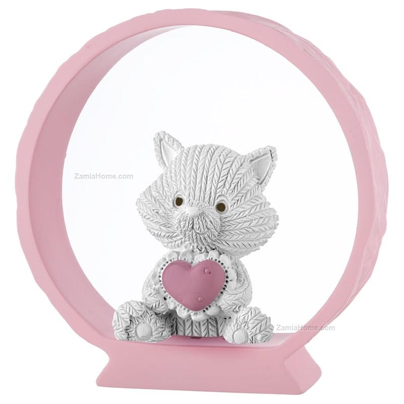Kitten on pink base