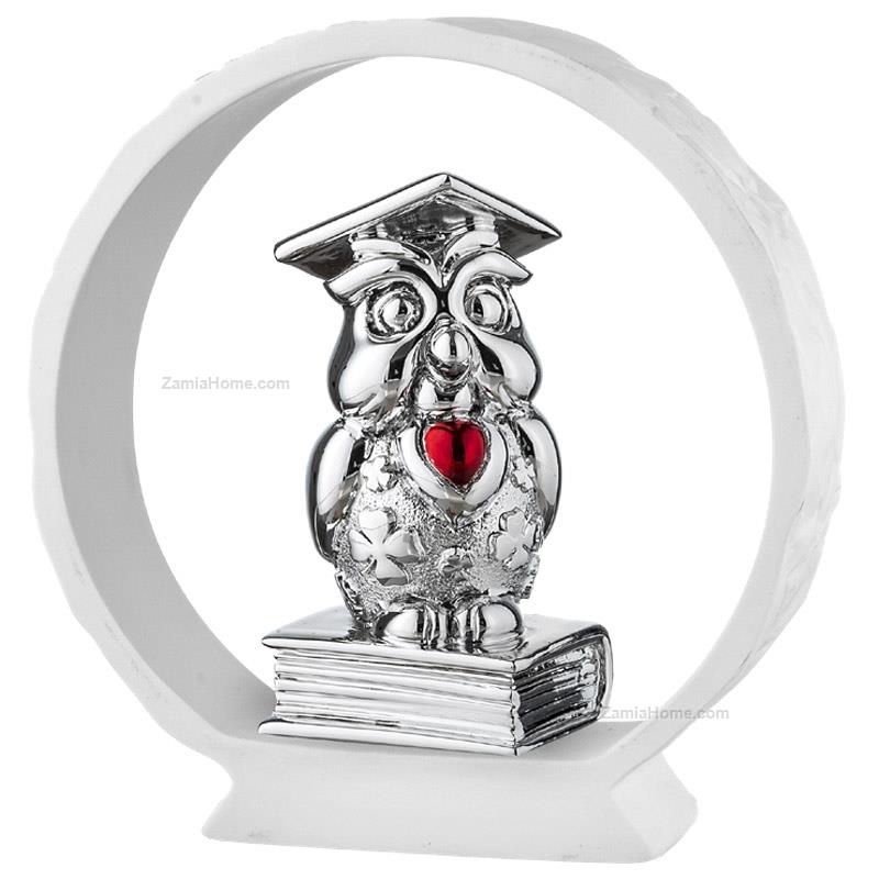 Graduation owl on white base