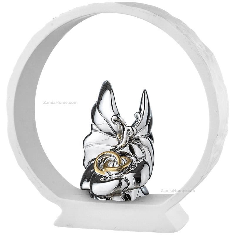 Butterfly with wedding rings