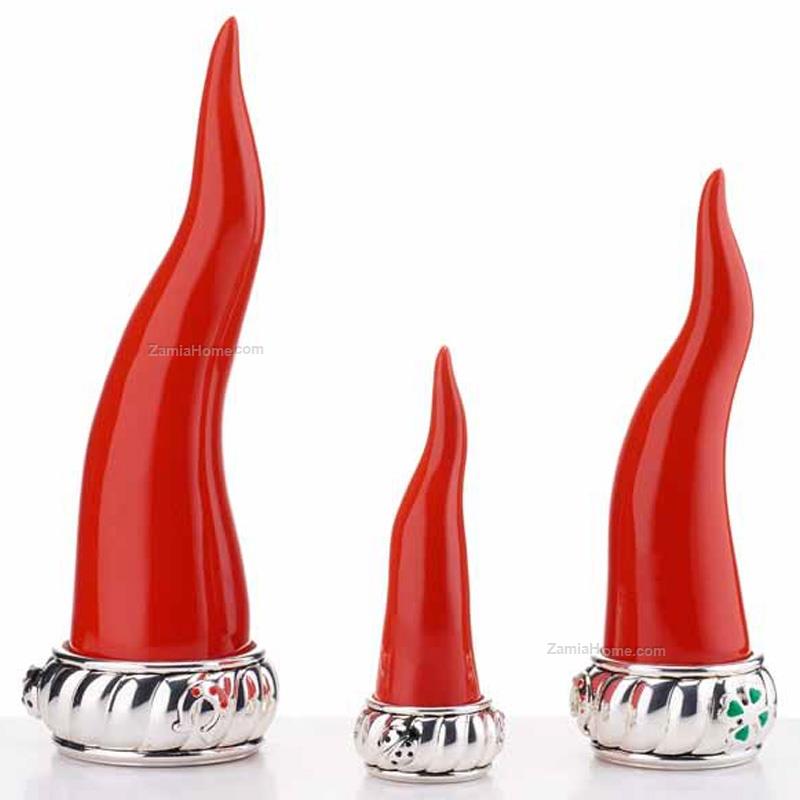 Red lucky horn on silver base